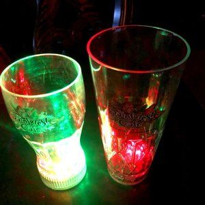 Two Rainforest Cafe Illuminte Clear Plastic Glasses